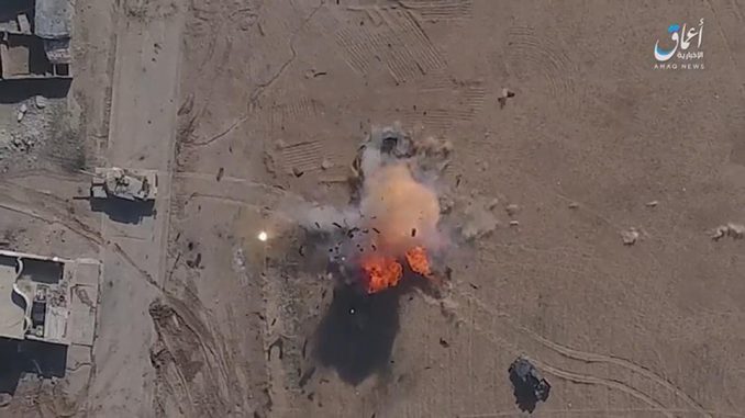 Effects of a homemade bomb dropped by an ISIS drone hitting an Iraqi Army Humvee near Mosul