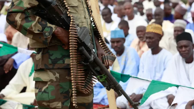 Membre des forces armées nigérianes. Auteur - Dimanche Alamba.