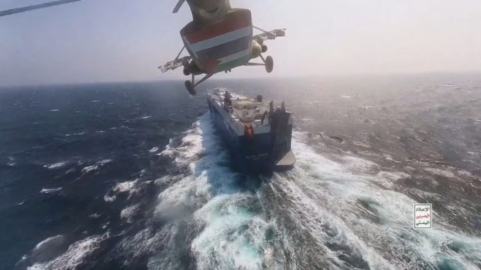 Houthi helicopter attacking the Galaxy Leader ship in the Red Sea on November 20, 2023