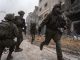 Des membres des Forces de défense israéliennes engagés dans des combats urbains